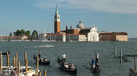 Beautiful Gondolas facing Church of San Giorgio Maggiore, in Venice, Italy Stock Footage