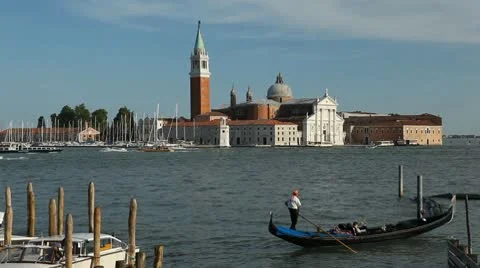 Beautiful Gondolas facing Church of San Giorgio Maggiore, in Venice, Italy Stock Footage