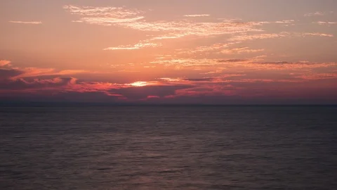 Beautiful gorgeous dramatic sunrise, sunset over the sea Video stock 94142212