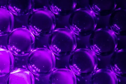 Beautiful gradient purple Emerald Balls Color Background. Marble Magic Arrangeme Ilustración de archivo