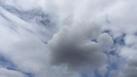 Beautiful gray clouds float smoothly over the blue sky Stock Footage 91158043