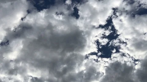 Beautiful gray clouds float smoothly across the sky Stock Footage 91338366