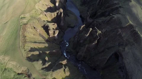Beautiful green canyon from above bird flies by aerial Stock Footage