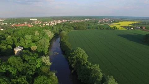 Beautiful, green fields, rape in the background, aerial view Stock Footage 85289310