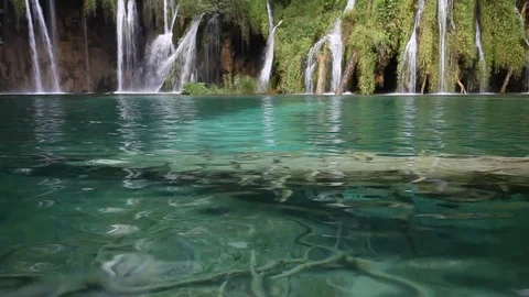 Beautiful green forest waterfall Stock Footage 79345359