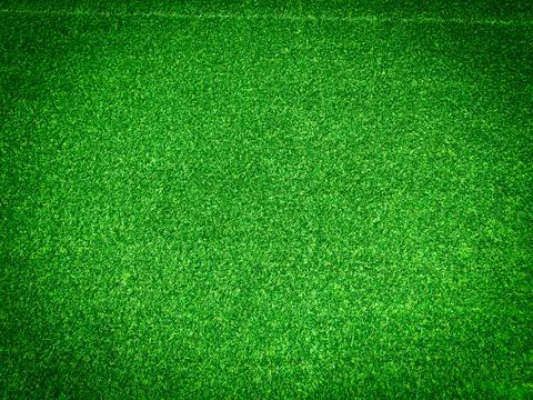 Beautiful green grass pattern from golf course for background. Copy space for Stock Photos