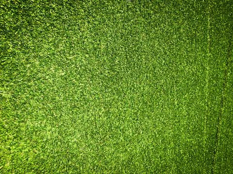 Beautiful green grass pattern from golf course for background. Copy space for Stock Photos