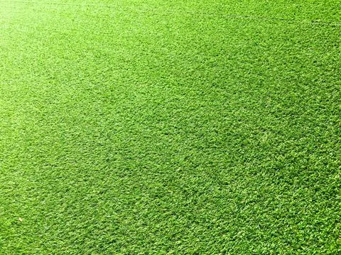 Beautiful green grass pattern from golf course for background. Copy space for Stock Photos