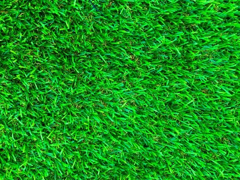 Beautiful green grass pattern from golf course for background. Copy space for Stock Photos