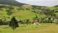 Beautiful green hills and cottage with red roof in village, Ukraine HD Footage