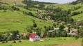 Beautiful green hills and village in Carpathians, Ukraine HD Footage