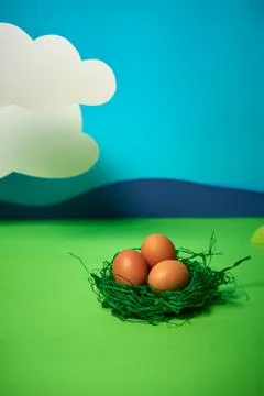 Beautiful green spring background with easter eggs Stock Photos