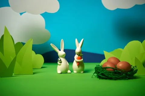 Beautiful green spring background with easter rabbits Stock Photos