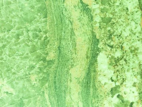 Beautiful, green texture with vertical patterns. Background with marble.  Stock Photos