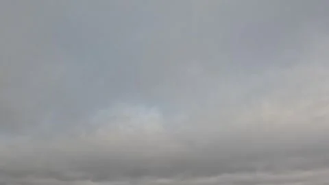 Beautiful grey textured clouds on a cloudy day. Time-lapse mode Stock Footage 308391280