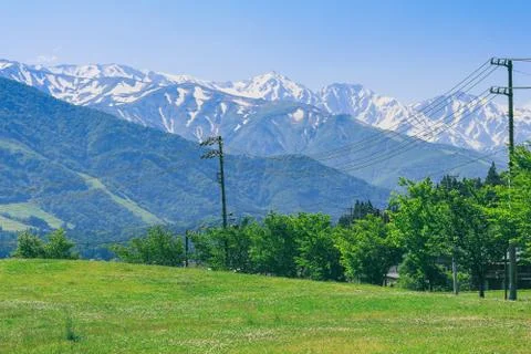 Beautiful Hakuba mountain range  in spring season , Nagano Prefecture Japan. Stock Photos