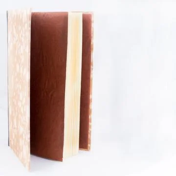 Beautiful hand binded book whith leather and waterprint paper Stock Photos