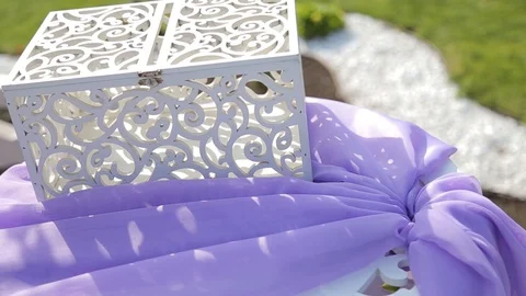 Beautiful handmade box for wedding money closeup Vidéo 123780557