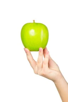 In beautiful hands a green apple , Isolated on white background Foto stock