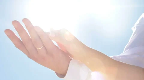 Beautiful hands of the newlyweds in the sun Stock Footage 60439902