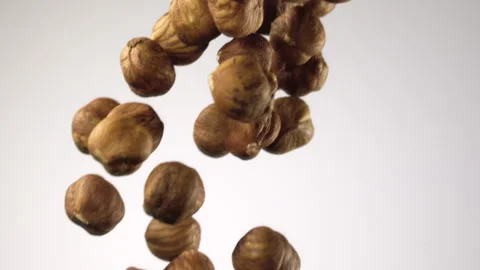 Beautiful hazelnuts falling in slow motion Stock Footage 151042649