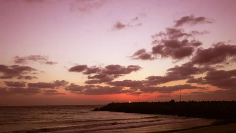 A beautiful HD sunset over the ocean as the sun dips below the horizon. Stock Footage 341542281