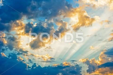 Beautiful heavenly landscape with the sun in the clouds. Stock Photos