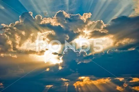 Beautiful heavenly landscape with the sun in the clouds. Stock Photos