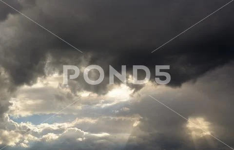 Beautiful heavenly landscape with the sun in the clouds. Stock Photos