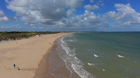 Beautiful high altitude aerial panoramic perspective of expansive sandy beach Stock Footage 340366552