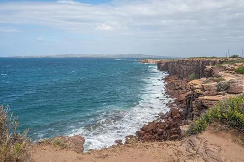 The beautiful high red cliffs of Macor on the island of Sant'Antioco in Sar.. Foto stock