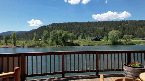 Beautiful Home View Moving Through Open Door Over Flowing River Stock-Footage 233457360
