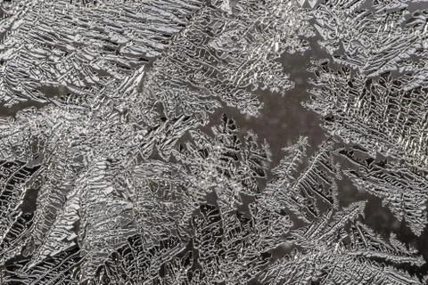 A beautiful horizontal macro texture in blue white and black color of frozen Stock Photos