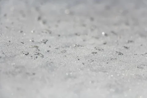 A beautiful horizontal macro texture in white and black color of ice and snow Fotos de archivo