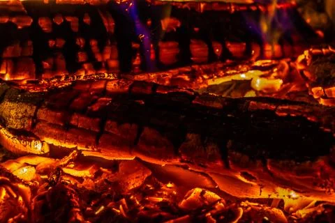 A beautiful horizontal texture of a burning fire on a black background with Stock Photos