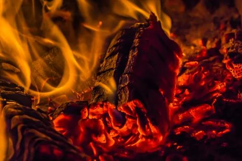 A beautiful horizontal texture of a burning fire on a black background with 스톡 사진
