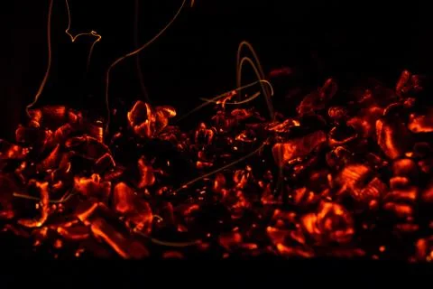 A beautiful horizontal texture of a burning fire on a black background with Stock Photos