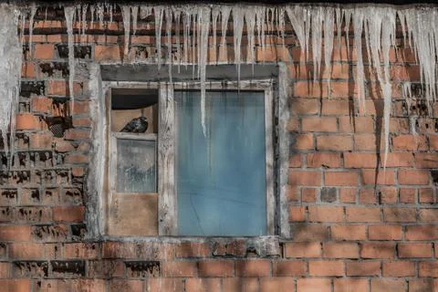 A beautiful horizontal texture of part of an old crashed brick wall in orange Stock Photos