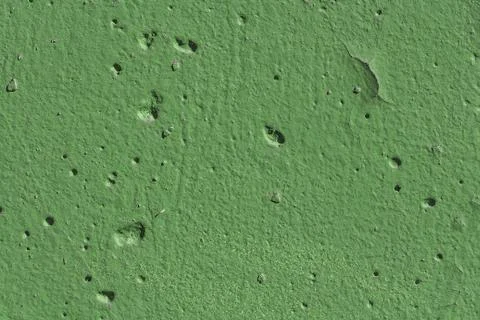 Beautiful horizontal texture of part of old concrete wall painted in green co Fotos Stock