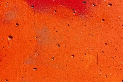 Beautiful horizontal texture of part of old concrete wall painted in orange c Foto stock