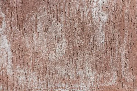 A beautiful horizontal texture of part of wall with white and orange and brow Foto stock