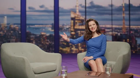 Beautiful host presenting guest in studio live tv show. Entertainment program Video stock 254130535