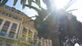 Beautiful hotel building and palm trees in resort city, summer vacation travel HD Footage