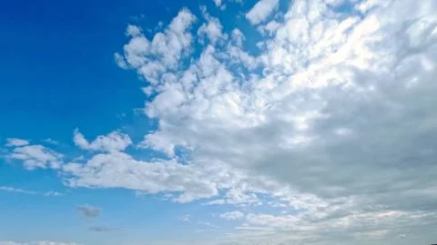 Beautiful huge clouds in the blue sky backdrop - photo of nature Stock Photos