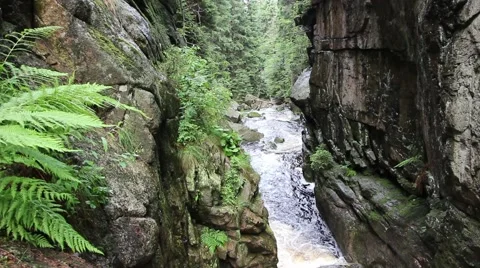 Beautiful, huge mountain brook surrounded by rocks Stock Footage 40299397