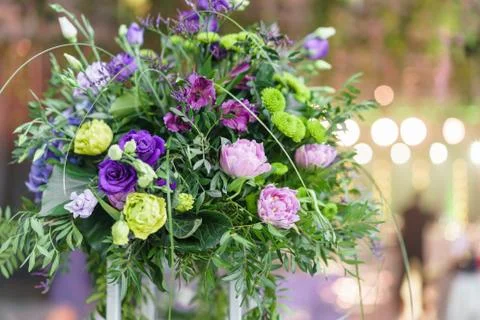 Beautiful hydrangea bouquets in vases on high stands. Flower arrangement on Stock Photos