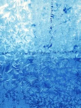 Beautiful ice pattern on winter window glass Stock Photos