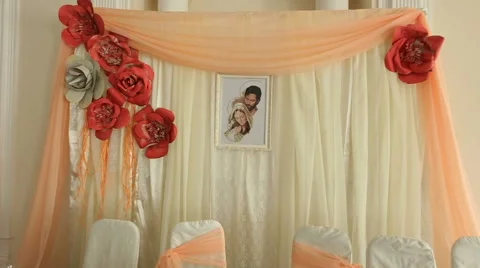 Beautiful icon hangs over wedding dinner table in the church Stock Footage 68837651