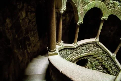 A beautiful image of the wall of a tower with windows and stairs from inside. Foto stock