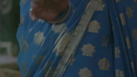 Beautiful Indian dancer dancing at a party with a blue traditional dress and Video stock 110771007